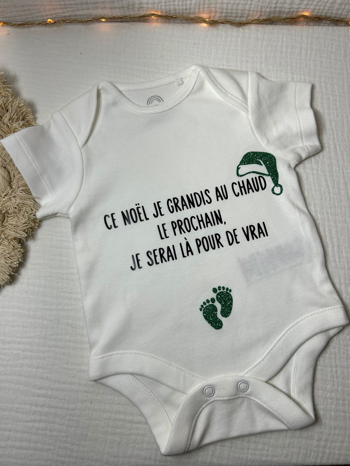 Body « Ce Noël je grandis au chaud le prochain je serai là pour de vrai »