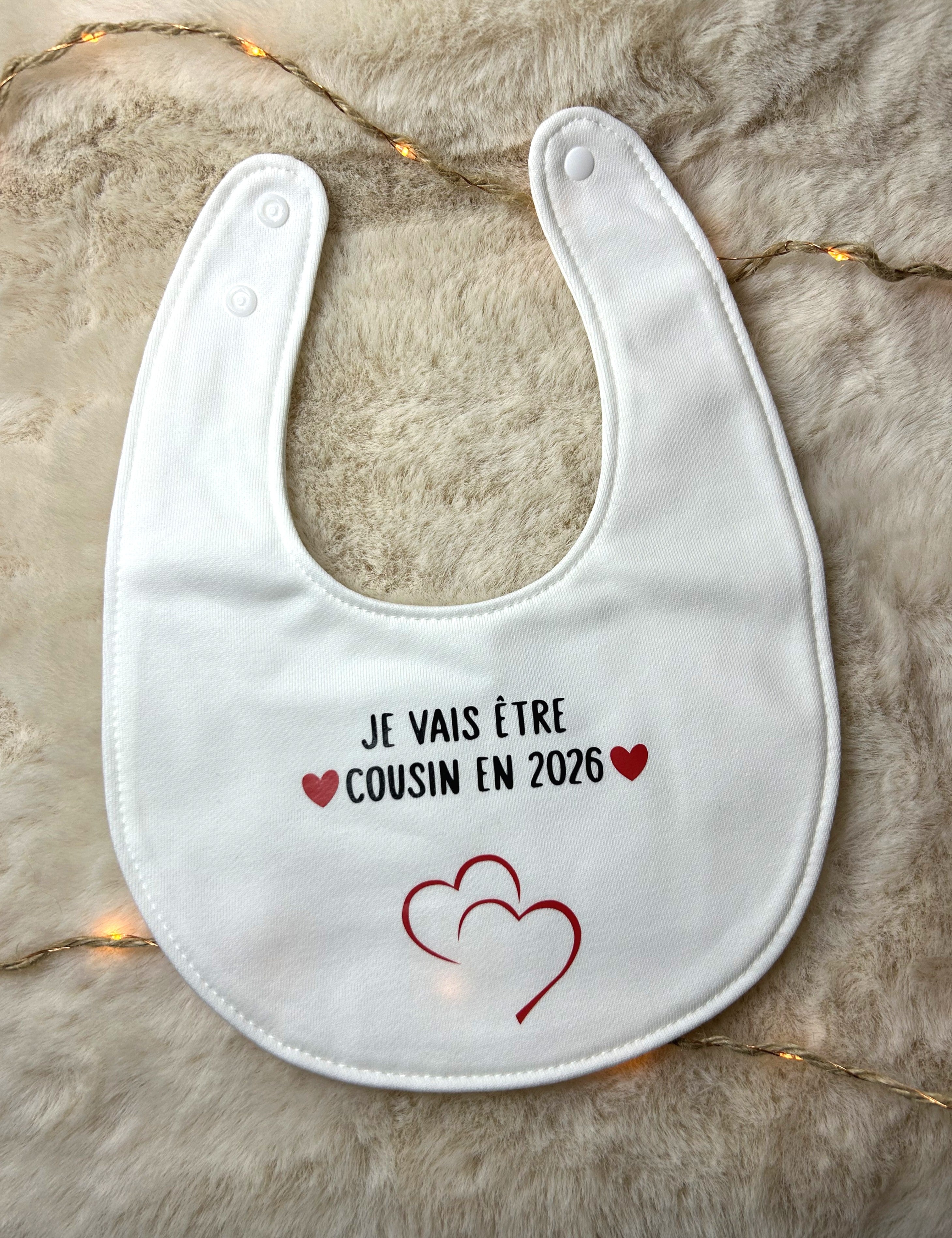 Bavoir « Je vais être cousin /cousine en 2026 »