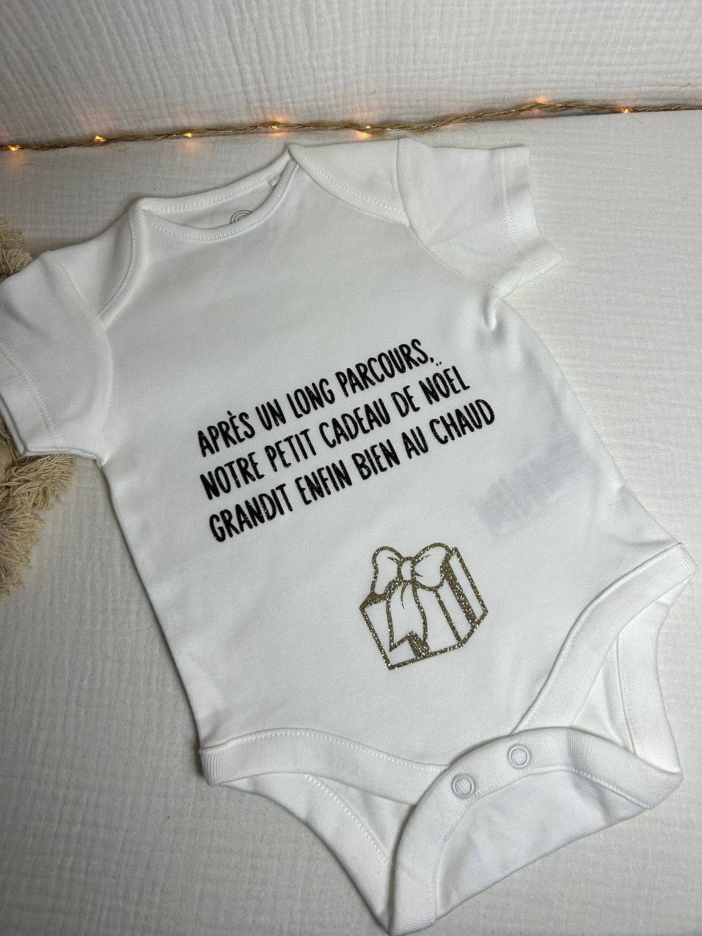 Body « Après un long parcours, notre petit cadeau de noël grandit enfin bien au chaud »