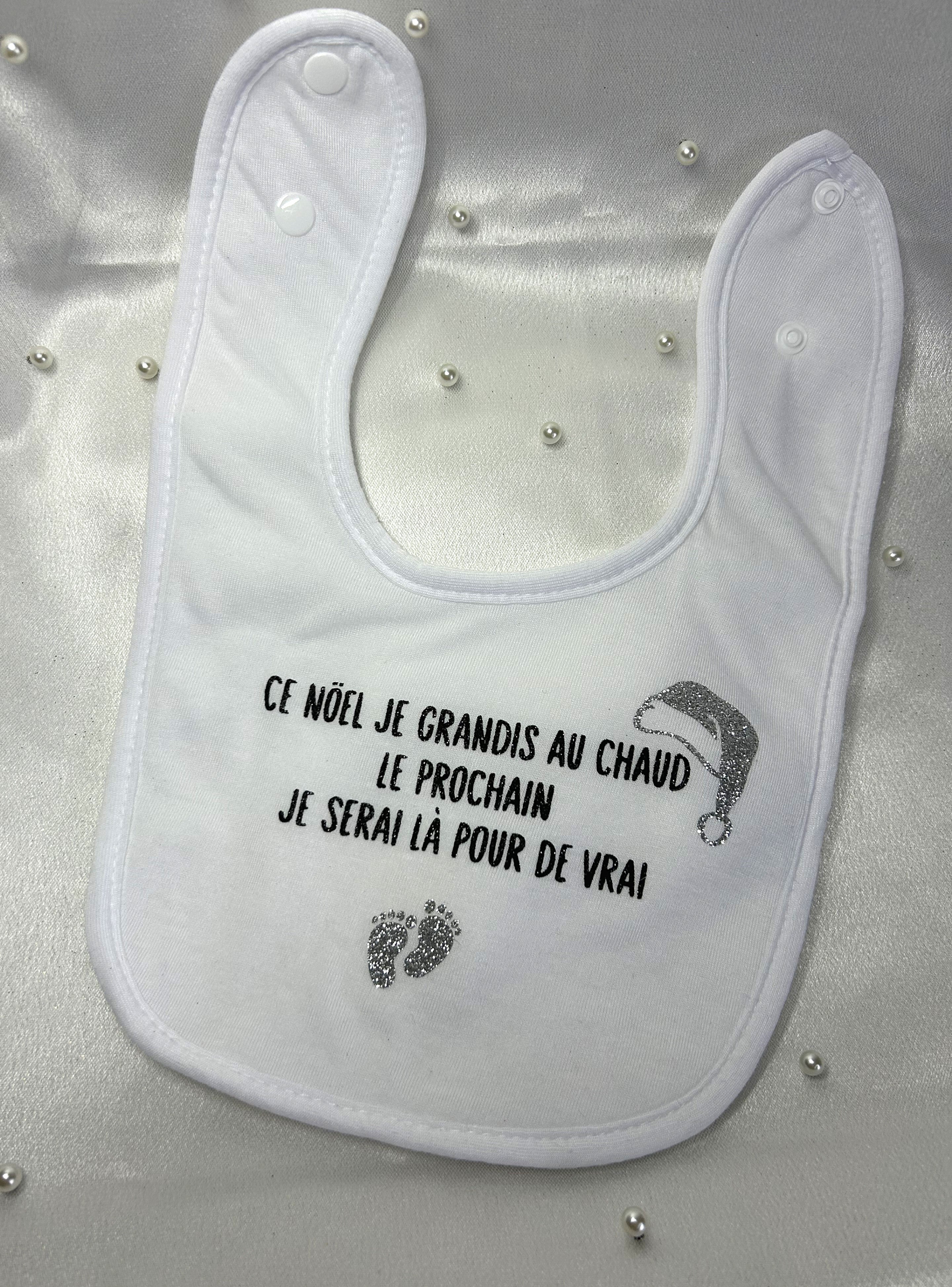 Bavoir « Ce Noël je grandis au chaud, le prochain je serai là pour de vrai »