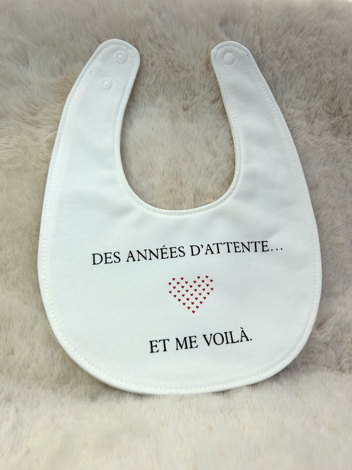 Bavoir « Des années d'attente... et me voilà »