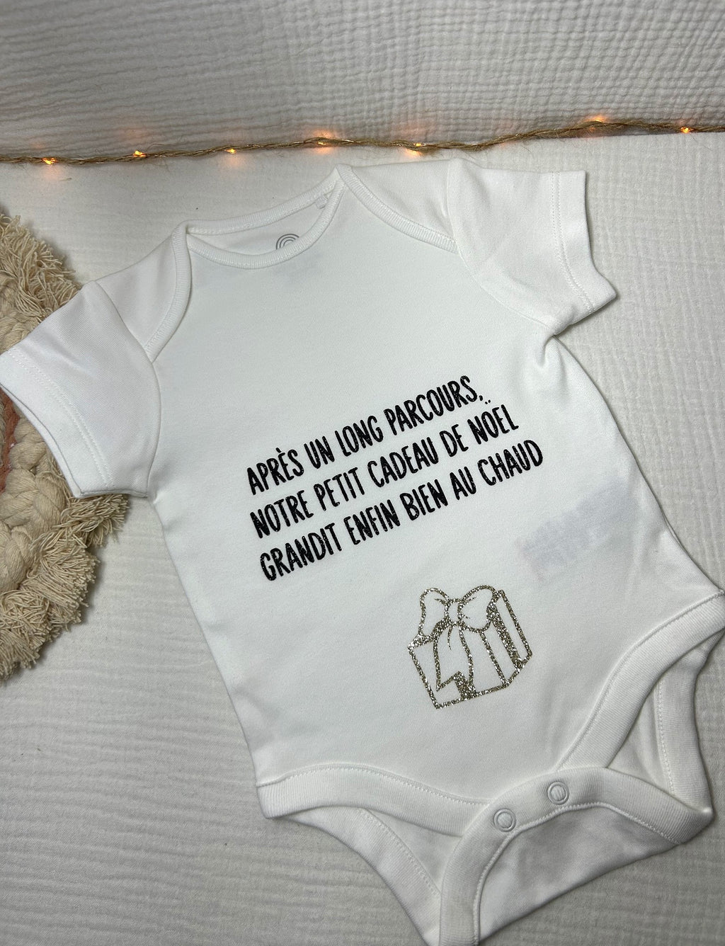 Body « Après un long parcours, notre petit cadeau de noël grandit enfin bien au chaud »