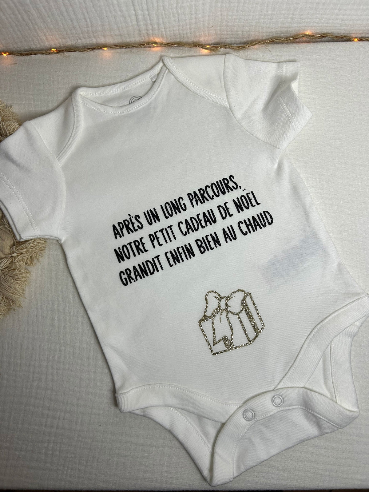 Body « Après un long parcours, notre petit cadeau de noël grandit enfin bien au chaud »