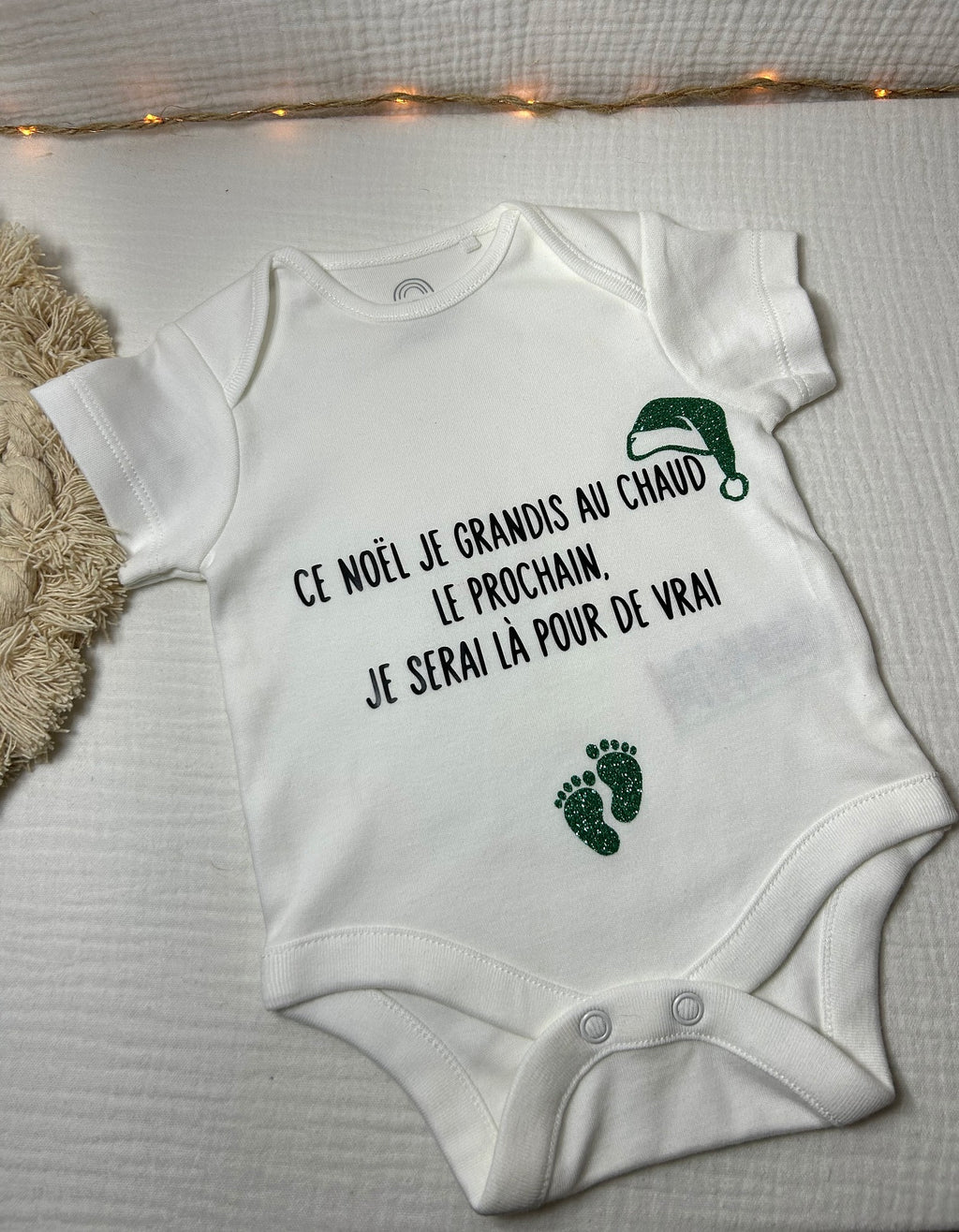 Body « Ce Noël je grandis au chaud le prochain je serai là pour de vrai »