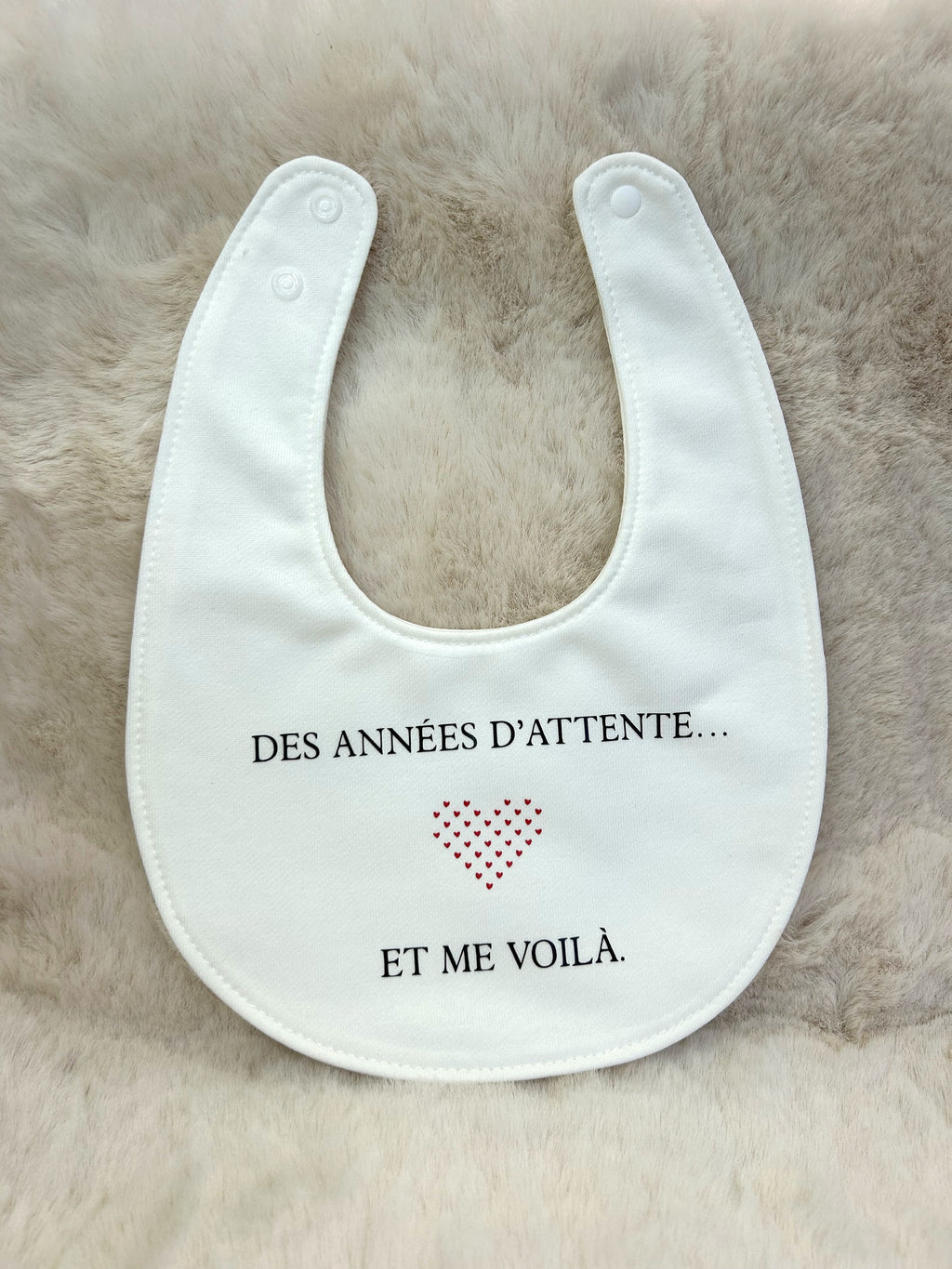 Bavoir « Des années d'attente... et me voilà »